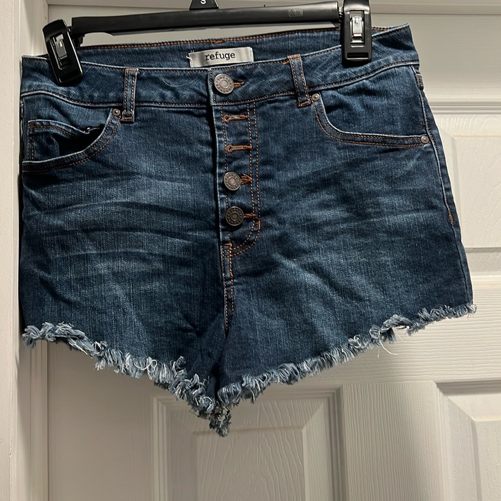 Dark wash denim shorts. High waisted. Size 6.